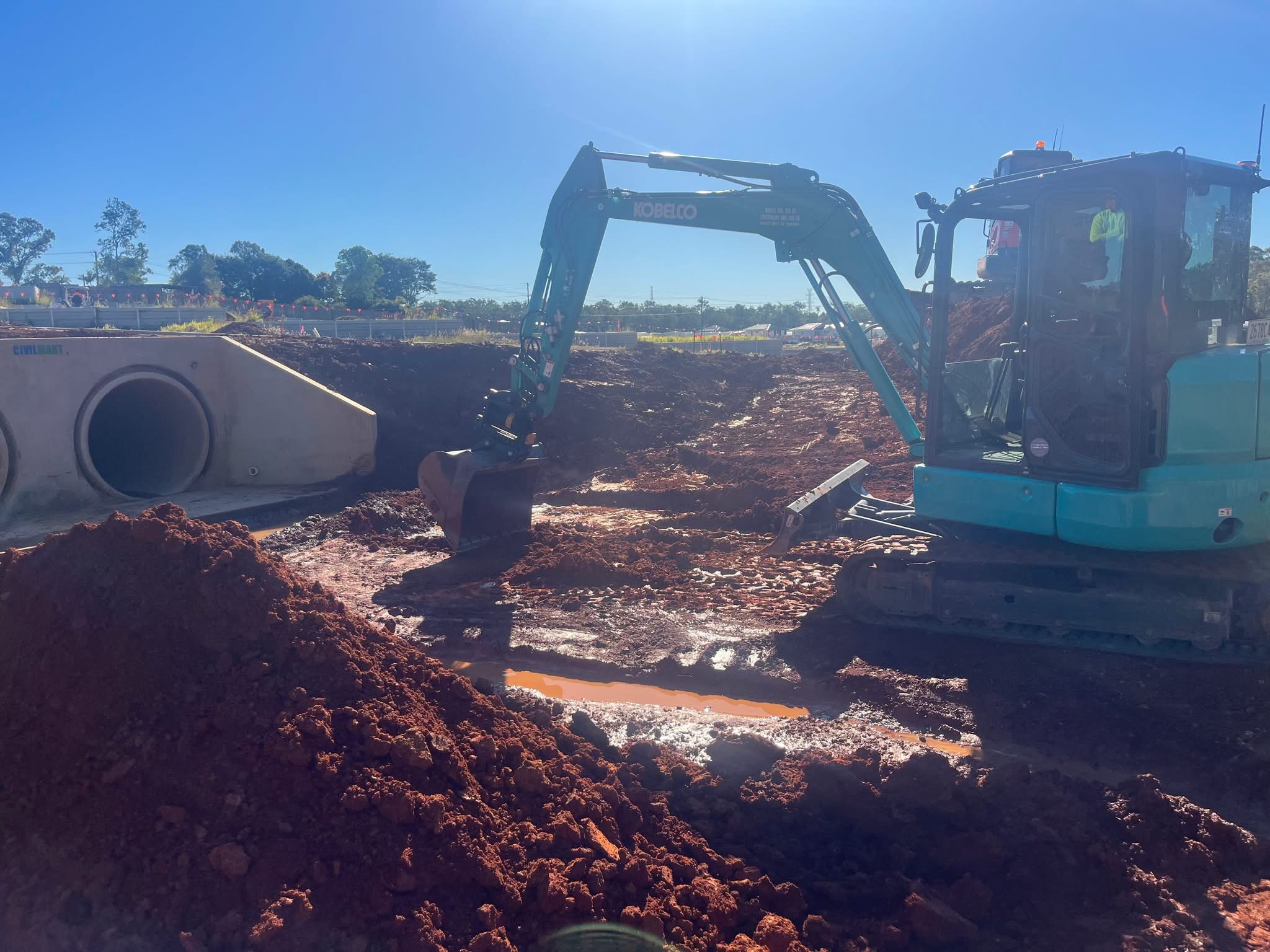 KKR excavator working beside a stormwater culvert