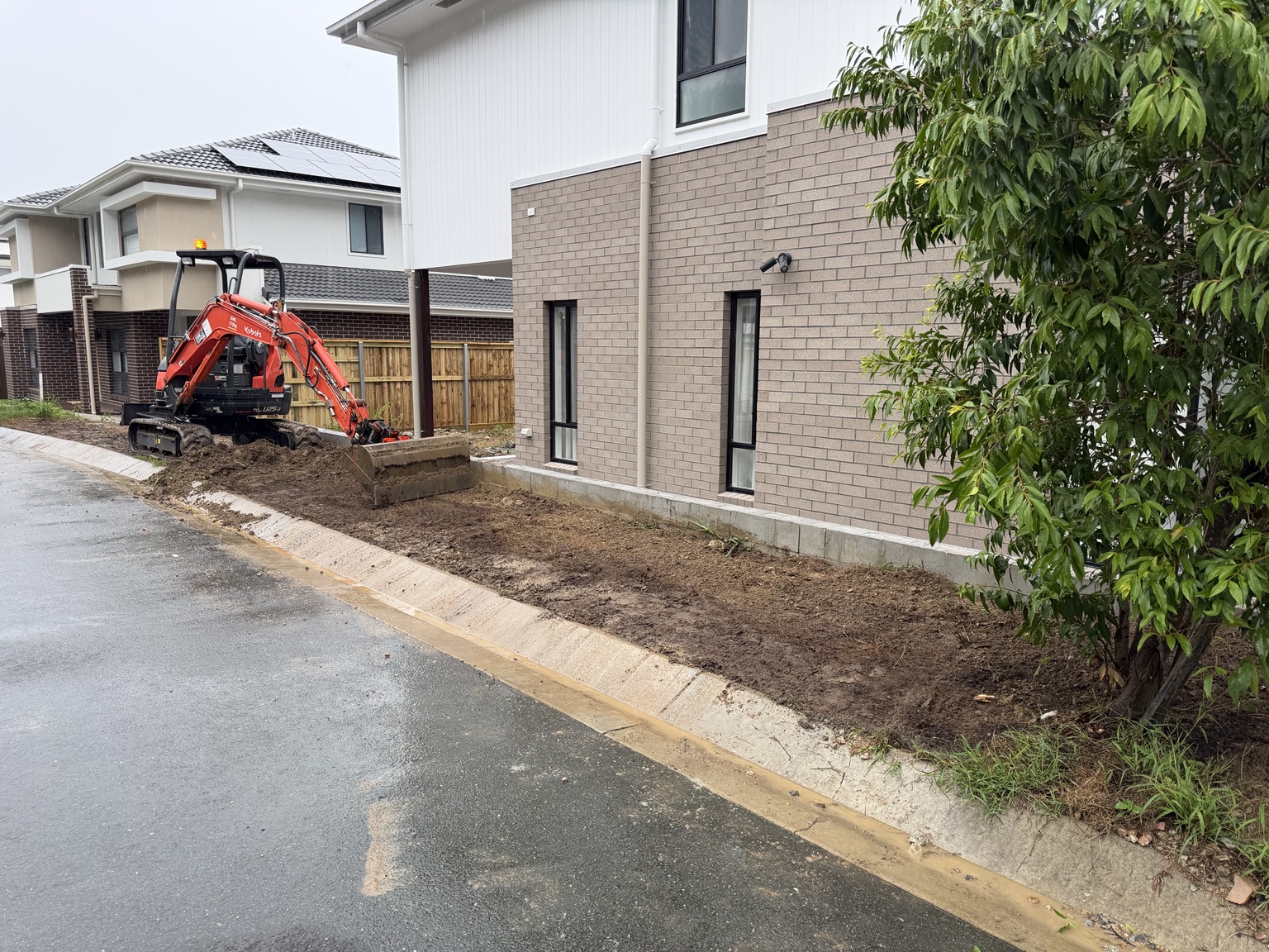 Mini excavator ground preparation