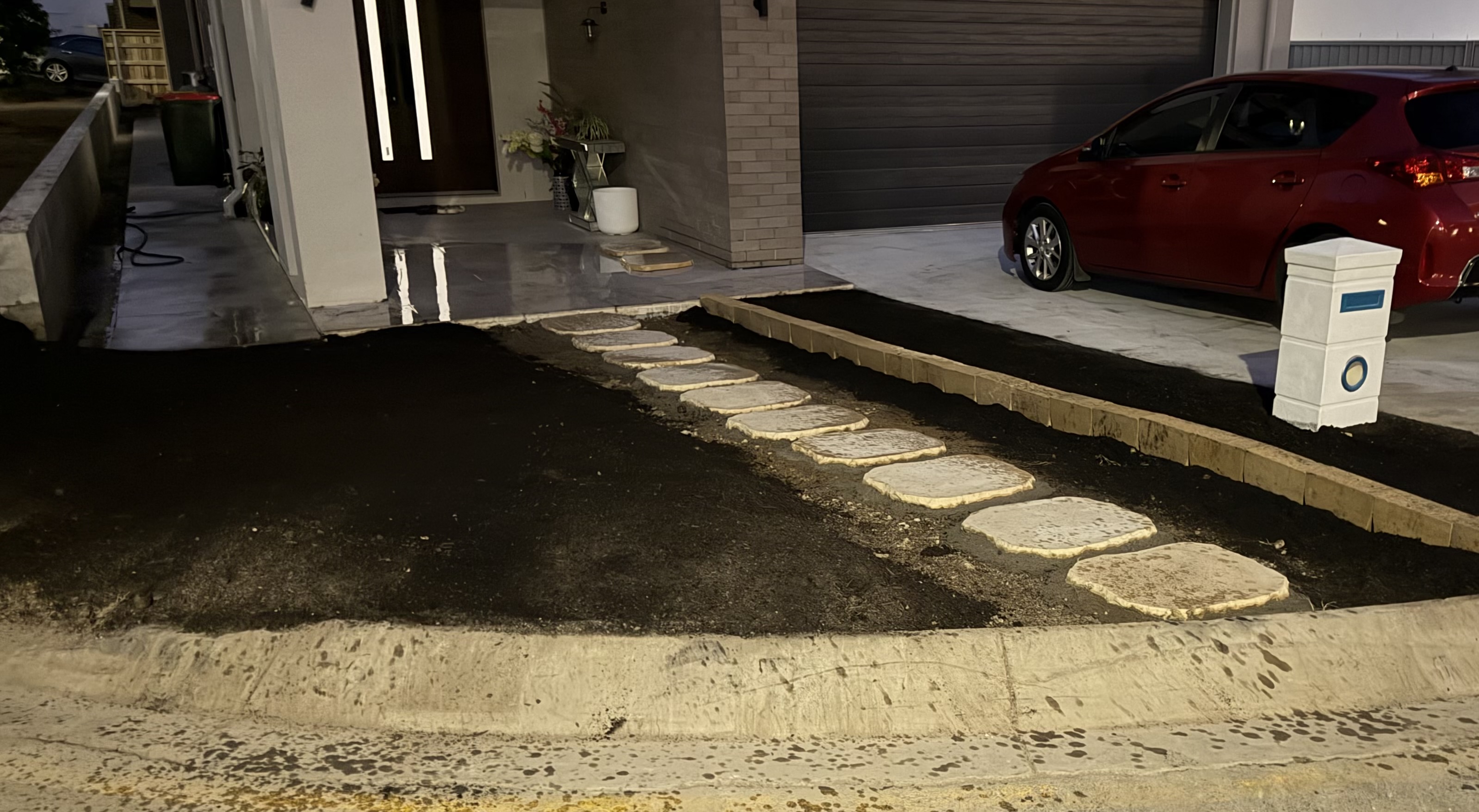 Front yard soil preparation and stepping stones